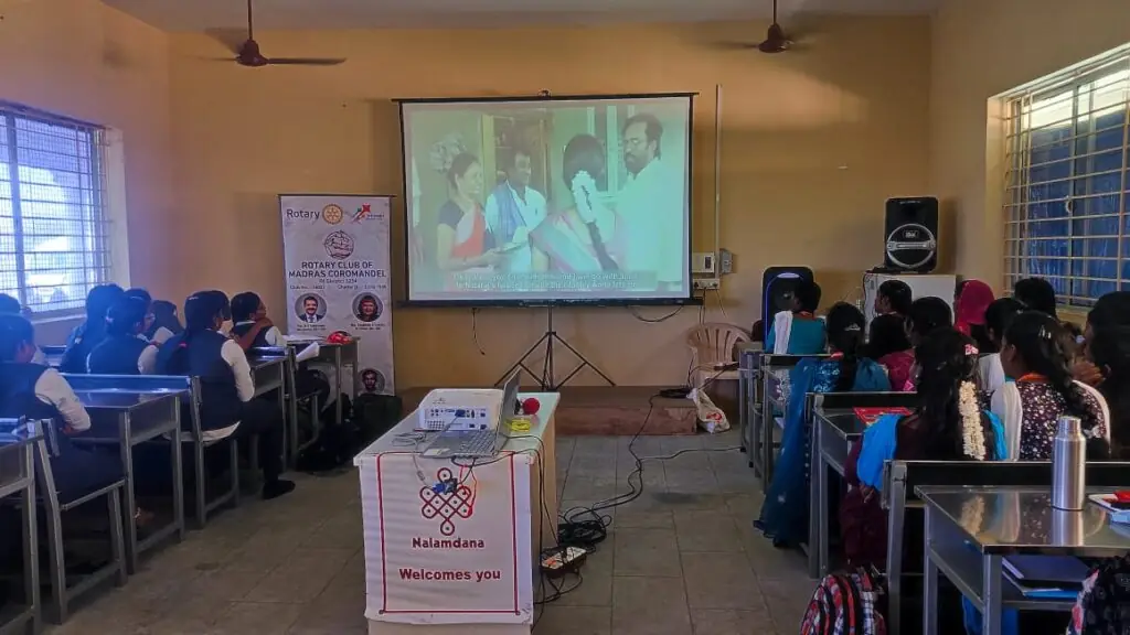 Cancer awareness program speaker addressing students